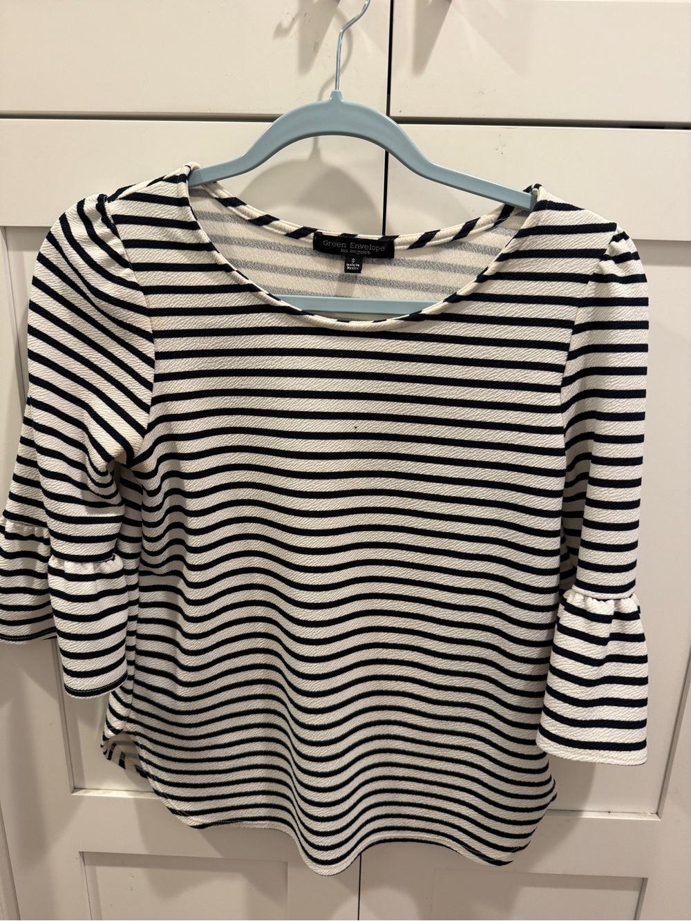 Green envelope women’s top